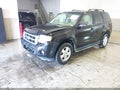 2011 Ford Escape — photo 2 of 16 | VIN 1FMCU0D75BKA93464