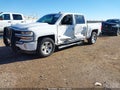 2018 Chevrolet Silverado 1500 — photo 2 of 16 | VIN 3GCUKREC7JG633255
