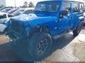 2014 Jeep Wrangler Unlimited — photo 2 of 16 | VIN 1C4BJWDG8EL235736