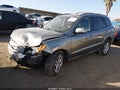 2012 Hyundai Santa Fe — photo 2 of 16 | VIN 5XYZK4AG1CG169009