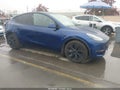 2025 Tesla Model Y — photo 1 of 21 | VIN 7SAYGDEE8SF238602