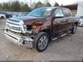 2014 Toyota Tundra — photo 2 of 16 | VIN 5TFAW5F12EX399654