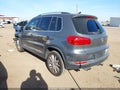 2013 Volkswagen Tiguan — photo 3 of 12 | VIN WVGAV7AX4DW023676