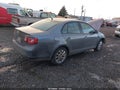 2010 Volkswagen Jetta — photo 4 of 20 | VIN 3VWRZ7AJ4AM123065