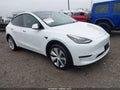 2021 Tesla Model Y — photo 1 of 11 | VIN 5YJYGDEE4MF114925