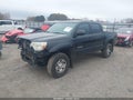 2015 Toyota Tacoma — photo 2 of 16 | VIN 3TMJU4GN4FM176119
