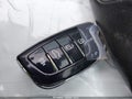 2014 Hyundai Santa Fe — photo 11 of 12 | VIN 5XYZU3LB8EG180436