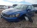 2016 Volkswagen Passat — photo 2 of 16 | VIN 1VWBT7A33GC030259
