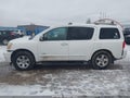 2005 Nissan Armada — photo 14 of 16 | VIN 5N1AA08B25N718372