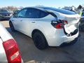 2022 Tesla Model Y — photo 3 of 17 | VIN 7SAYGDEE0NF370077
