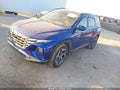 2022 Hyundai Tucson — photo 2 of 16 | VIN 5NMJC3AE2NH126598