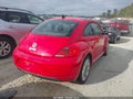 2012 Volkswagen Beetle — photo 4 of 11 | VIN 3VWJX7ATXCM646792