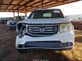 2014 Honda Pilot — photo 13 of 17 | VIN 5FNYF3H42EB013092