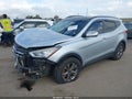2015 Hyundai Santa Fe — photo 2 of 15 | VIN 5XYZU3LB0FG260234