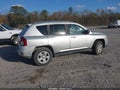 2014 Jeep Compass — photo 4 of 13 | VIN 1C4NJCBA4ED509535