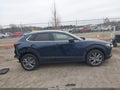 2024 Mazda CX-30 — photo 13 of 16 | VIN 3MVDMBDMXRM679069