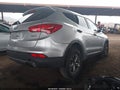 2016 Hyundai Santa Fe — photo 4 of 17 | VIN 5XYZT3LB5GG317287