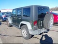 2008 Jeep Wrangler Unlimited — photo 3 of 16 | VIN 1J4GA39128L578100