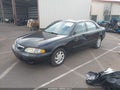 1999 Mazda 626 — photo 2 of 17 | VIN 1YVGF22C6X5854224