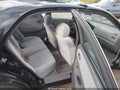 1999 Mazda 626 — photo 8 of 17 | VIN 1YVGF22C6X5854224
