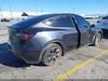 2024 Tesla Model Y — photo 4 of 22 | VIN 7SAYGDED2RF116545