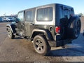 2014 Jeep Wrangler Unlimited — photo 3 of 16 | VIN 1C4BJWDG8EL140867