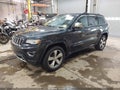 2014 Jeep Grand Cherokee — photo 2 of 16 | VIN 1C4RJFCG4EC441779