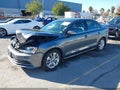 2015 Volkswagen Jetta — photo 2 of 18 | VIN 3VWD17AJ8FM233156