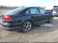 2014 Volkswagen Passat — photo 4 of 10 | VIN 1VWCN7A32EC056492