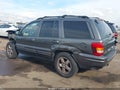 2004 Jeep Grand Cherokee — photo 3 of 19 | VIN 1J8GW58N84C414294