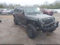 2014 Jeep Wrangler Unlimited — photo 1 of 18 | VIN 1C4BJWDG1EL298628