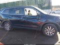 2022 Honda Pilot — photo 13 of 16 | VIN 5FNYF6H54NB008390