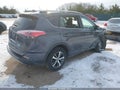 2018 Toyota RAV4 — photo 4 of 17 | VIN 2T3RFREV8JW787954