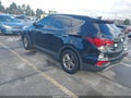 2017 Hyundai Santa Fe — photo 3 of 16 | VIN 5XYZU3LB7HG483082