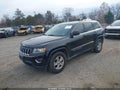 2014 Jeep Grand Cherokee — photo 2 of 16 | VIN 1C4RJFAG4EC335481
