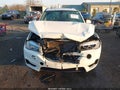 2014 BMW X5 — photo 12 of 16 | VIN 5UXKR0C5XE0H28603