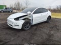 2025 Tesla Model Y — photo 2 of 20 | VIN 7SAYGDED4SA375296