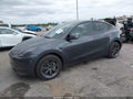 2025 Tesla Model Y — photo 2 of 19 | VIN 7SAYGDED5SA374996