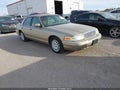 1999 Ford Crown Victoria — photo 1 of 11 | VIN 2FAFP73W4XX136437