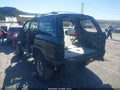 2004 Chevrolet Tahoe — photo 3 of 15 | VIN 1GNEK13T84R272994