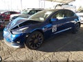 2022 Tesla Model 3 — photo 2 of 16 | VIN 5YJ3E1EC6NF279051