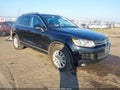 2014 Volkswagen Touareg — photo 1 of 16 | VIN WVGEF9BP6ED005878