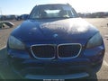 2013 BMW X1 — photo 12 of 16 | VIN WBAVL1C59DVR81963