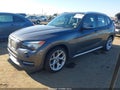 2013 BMW X1 — photo 2 of 12 | VIN WBAVL1C58DVR86118