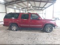 2004 Chevrolet Suburban 1500 — photo 12 of 15 | VIN 1GNEC16Z14J234504