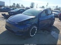 2021 Tesla Model Y — photo 2 of 20 | VIN 5YJYGDED4MF123082