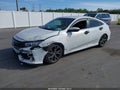 2019 Honda Civic — photo 2 of 16 | VIN 19XFC2E86KE004477