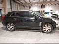 2015 Cadillac SRX — photo 13 of 16 | VIN 3GYFNCE33FS627769