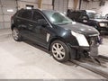 2015 Cadillac SRX — photo 1 of 16 | VIN 3GYFNCE33FS627769
