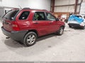 2006 Kia Sportage — photo 4 of 12 | VIN KNDJF723567139012
